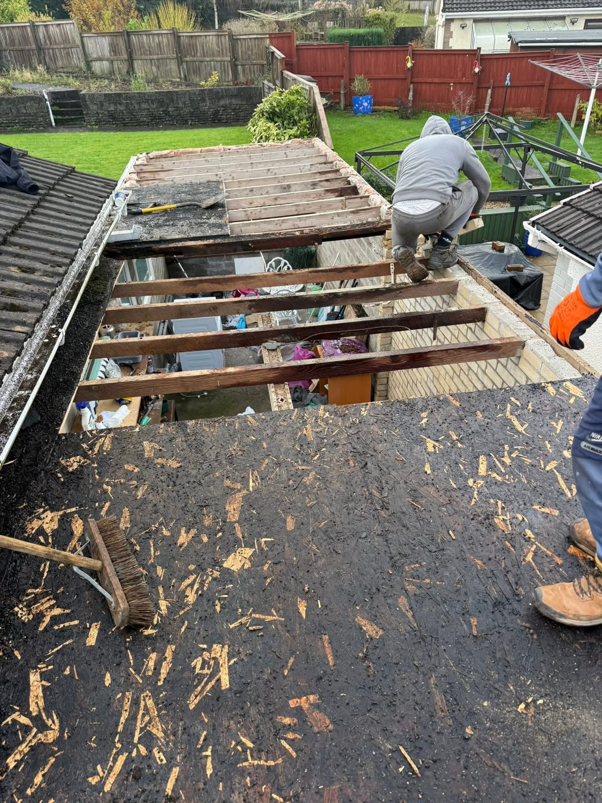 Flat roof repairs Glasgow: failed flat roof stripped back to the joists